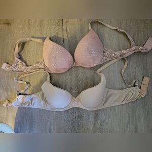 2 Victoria secret 34B bras great condition 1 Bombshell, 1 demi pushups